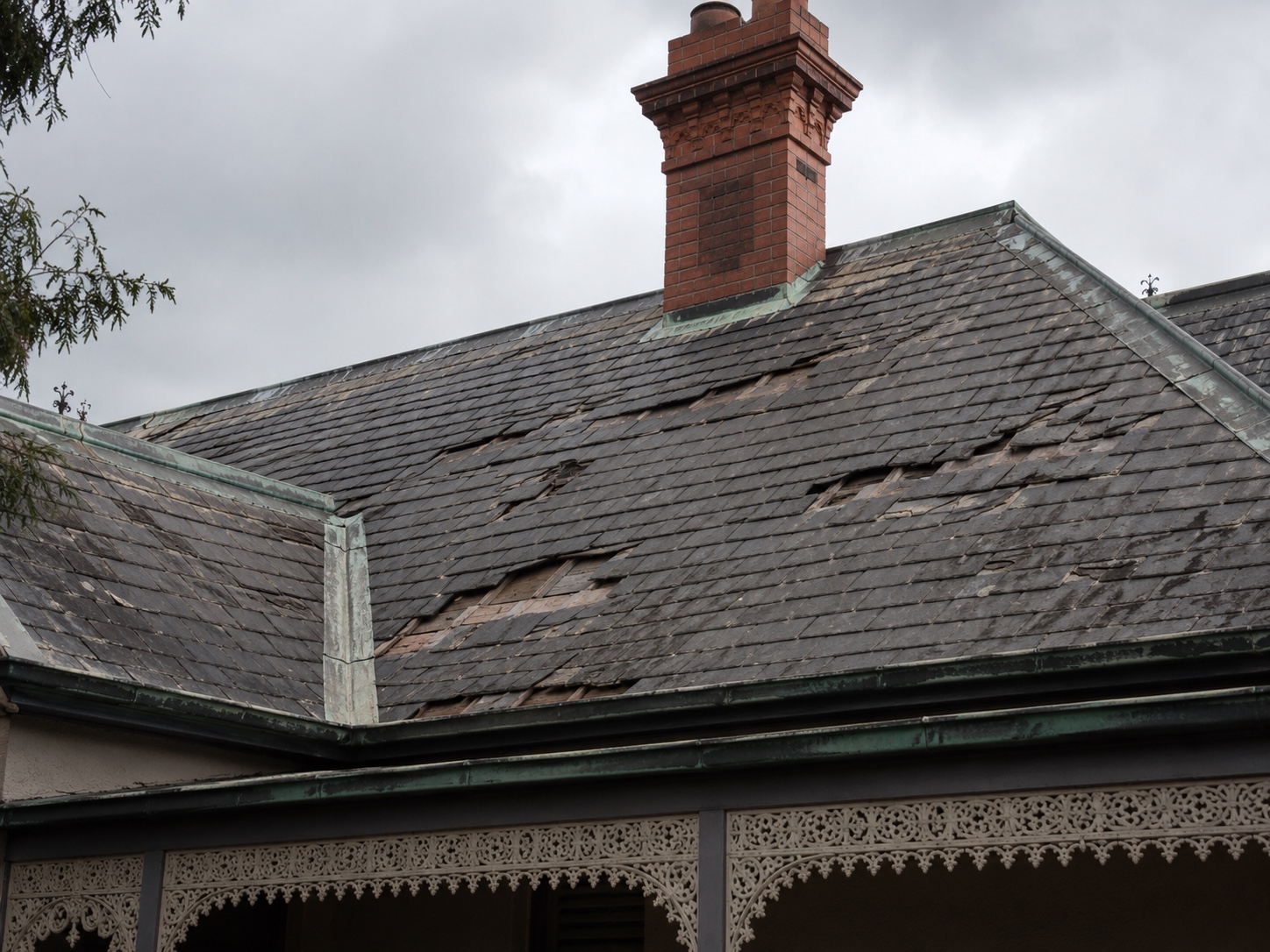 Cracked slate roof before restoration